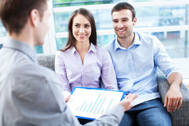 Clients meeting with Mortgage Broker in office